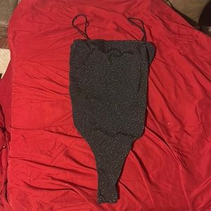Black sparkly body suit